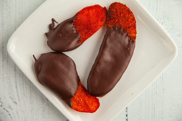 Chili Mango Dipped in Dark Chocolate - Romanicos Chocolate
