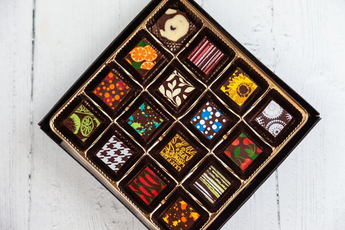 In this photo illustration boxes of chocolates seen displayed in